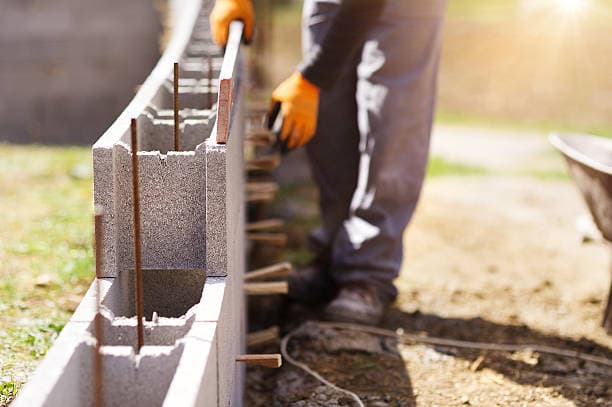 Expert bricklayer on Australian construction site - Bricklaying positions