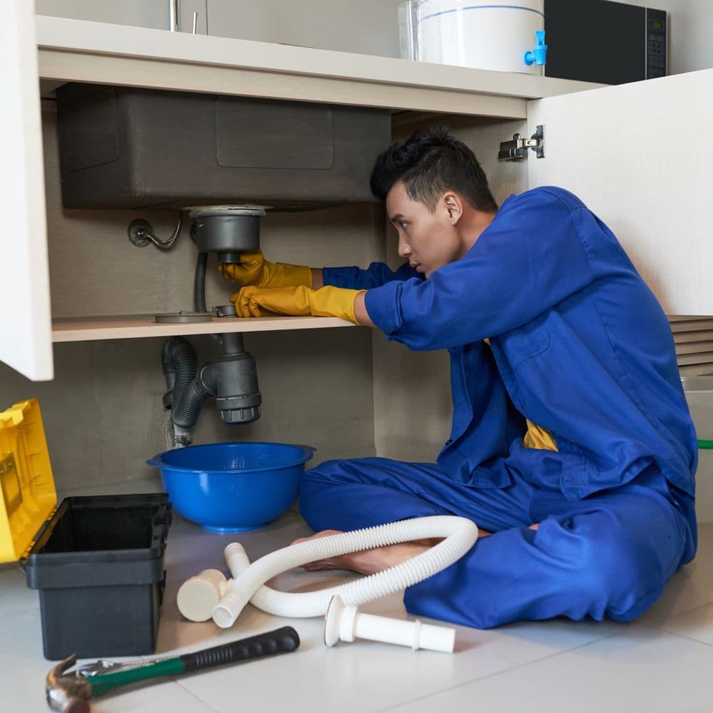 Professional plumber at work in Australia - Plumbing trade positions